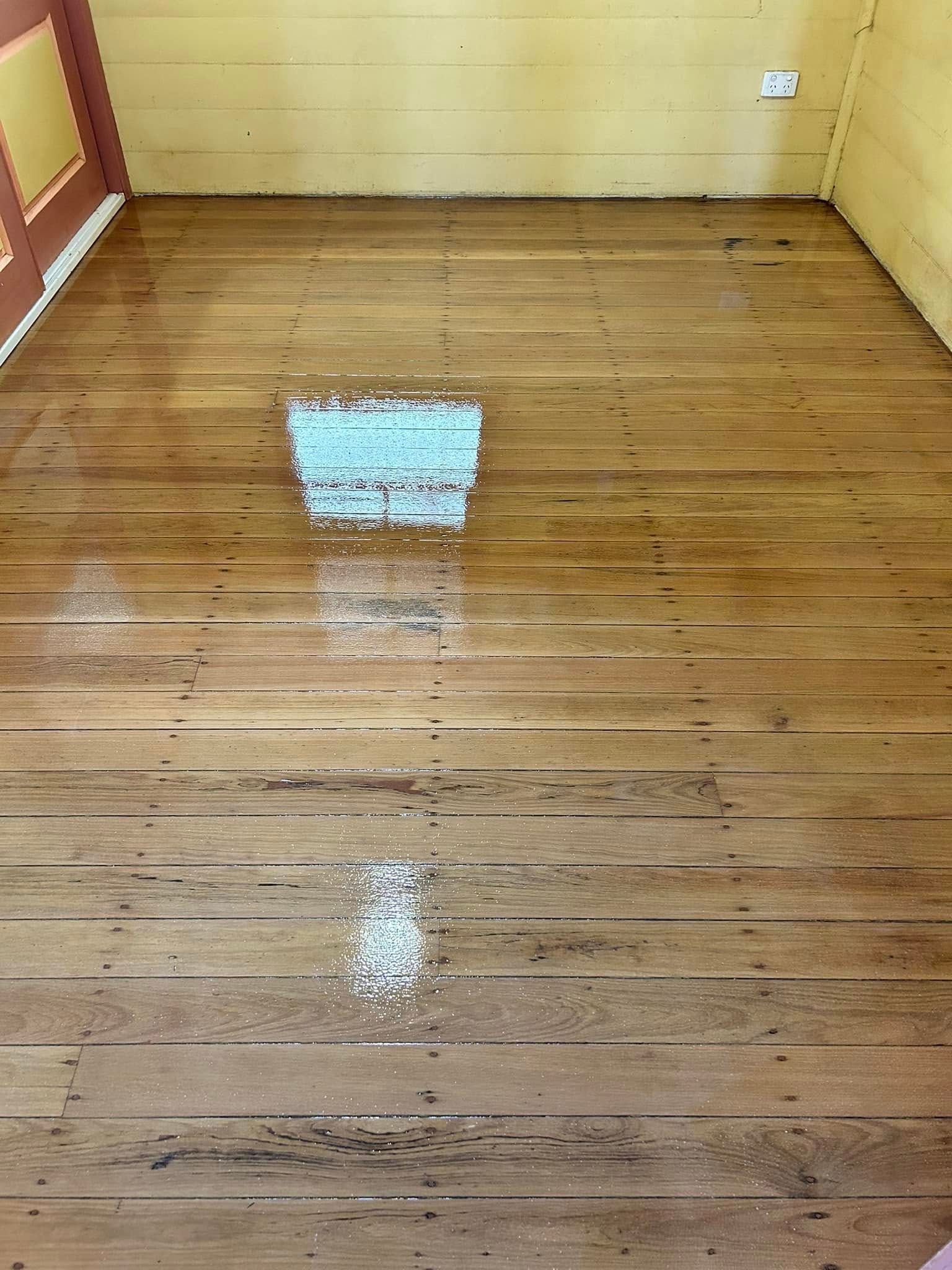 Wooden Floor With Yellow Walls — Scott Johnston Floor Sanding in Port Douglas, QLD
