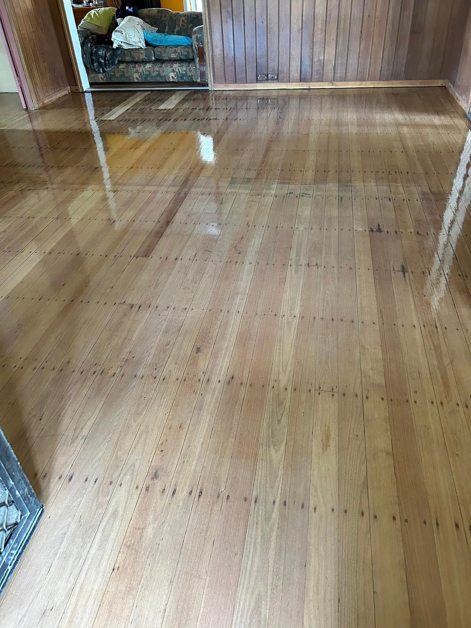 Shiny Hardwood Floor In A Room, Reflecting Light — Scott Johnston Floor Sanding in Port Douglas, QLD