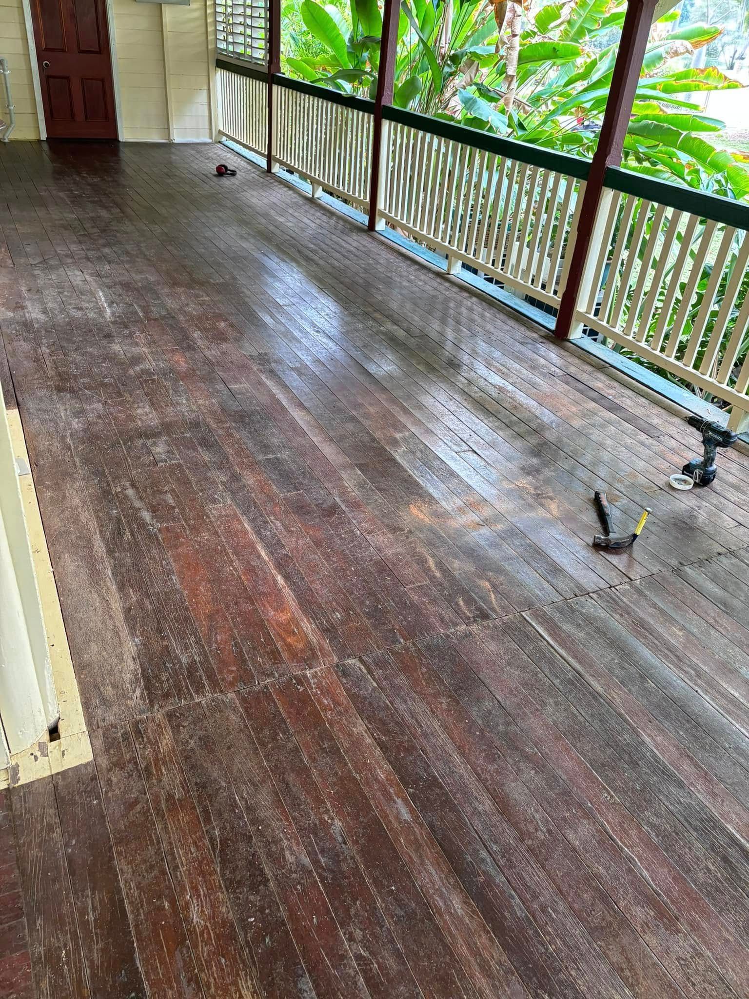 Wooden Deck With Worn, Reddish-brown Boards — Scott Johnston Floor Sanding in Bentley Park QLD