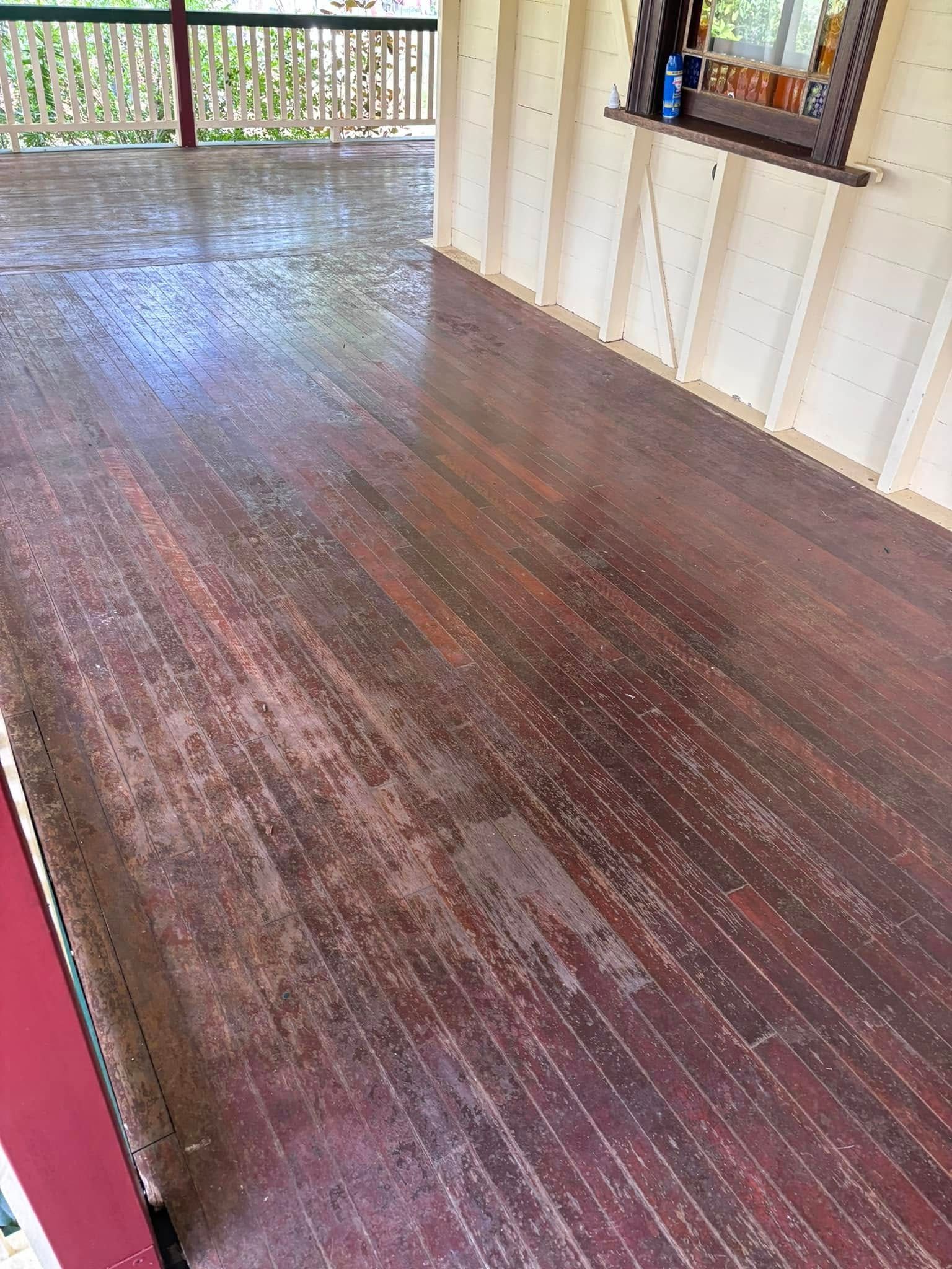 Wooden Floor With Alternating Light and Dark Wood Planks — Scott Johnston Floor Sanding in Bentley Park QLD