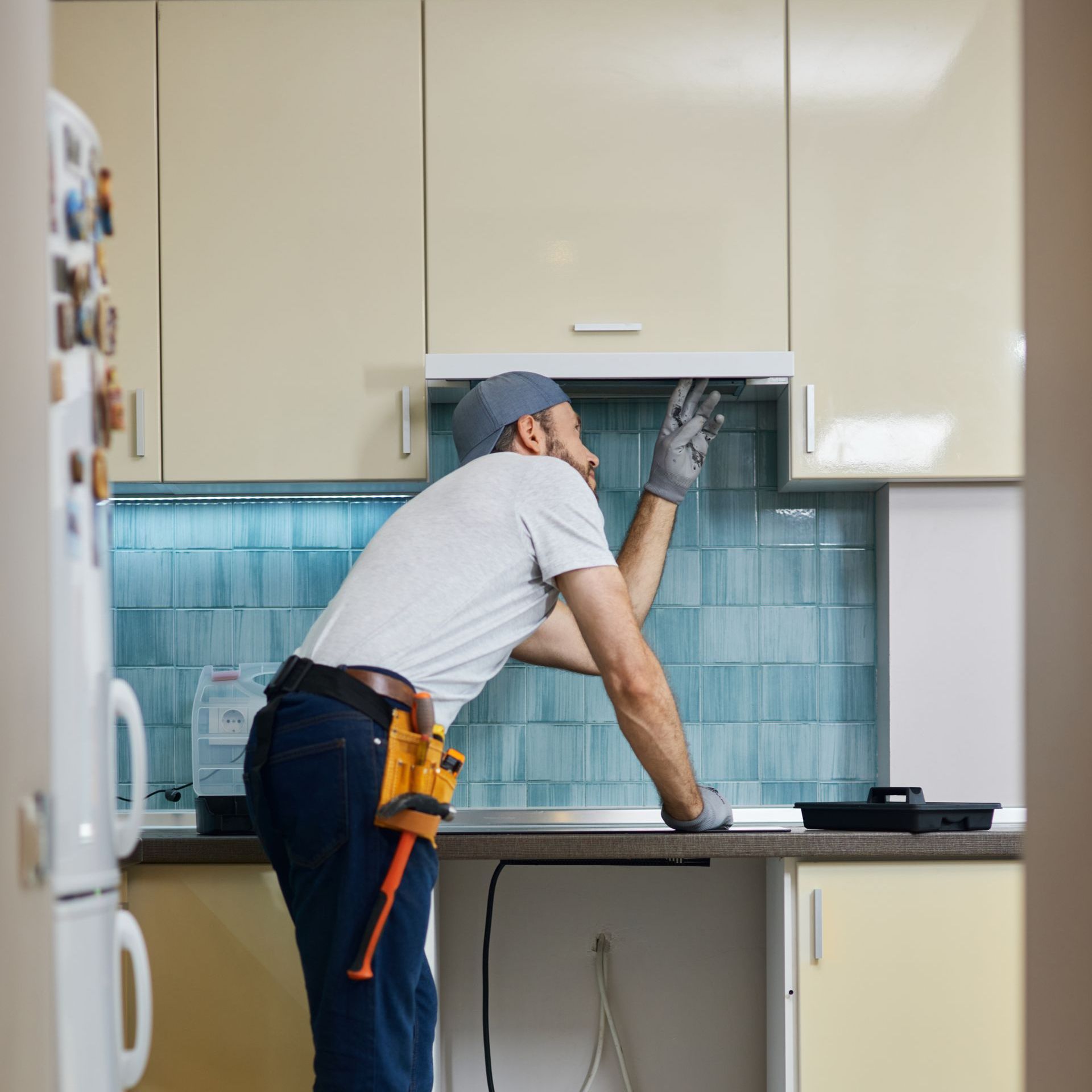 Man installing appliance