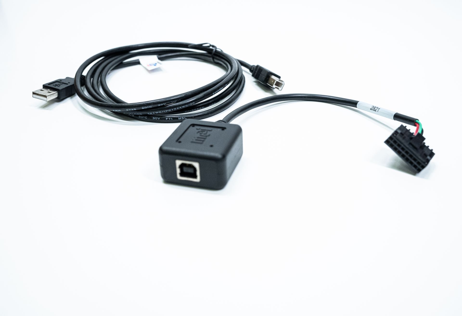 Black car diagnostic cable with USB and connector ends on a white background.