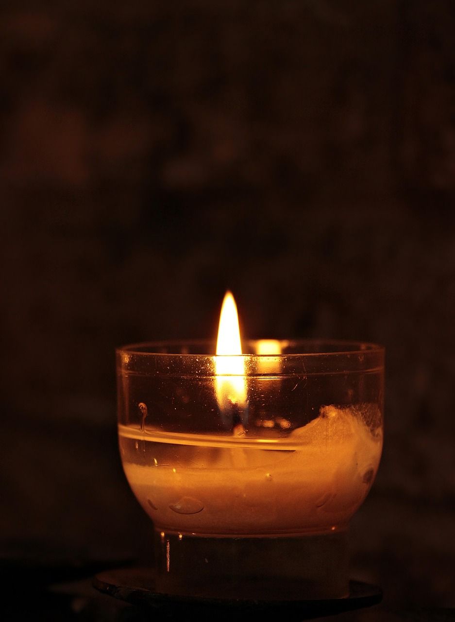 Tea light with dark background