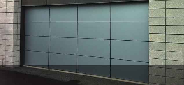 A close up of a garage door on a building.