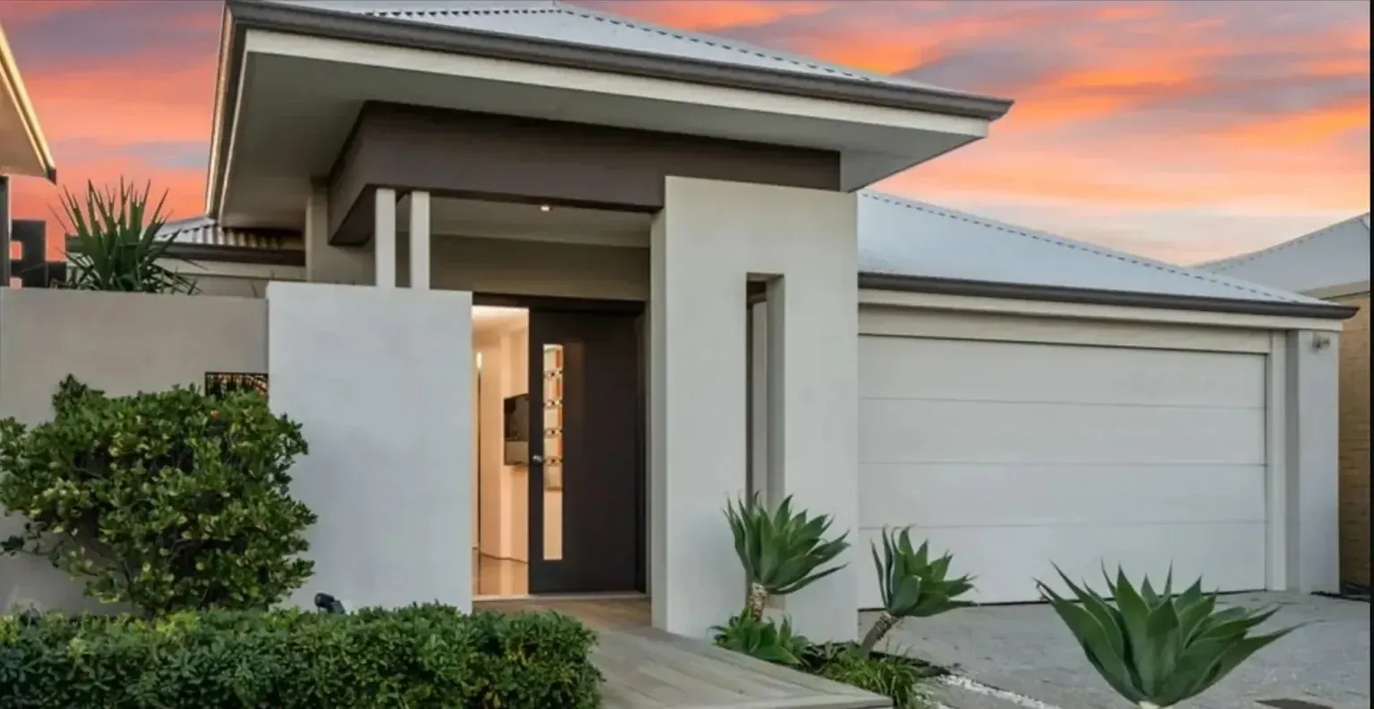 A close up of a garage door with the door open.