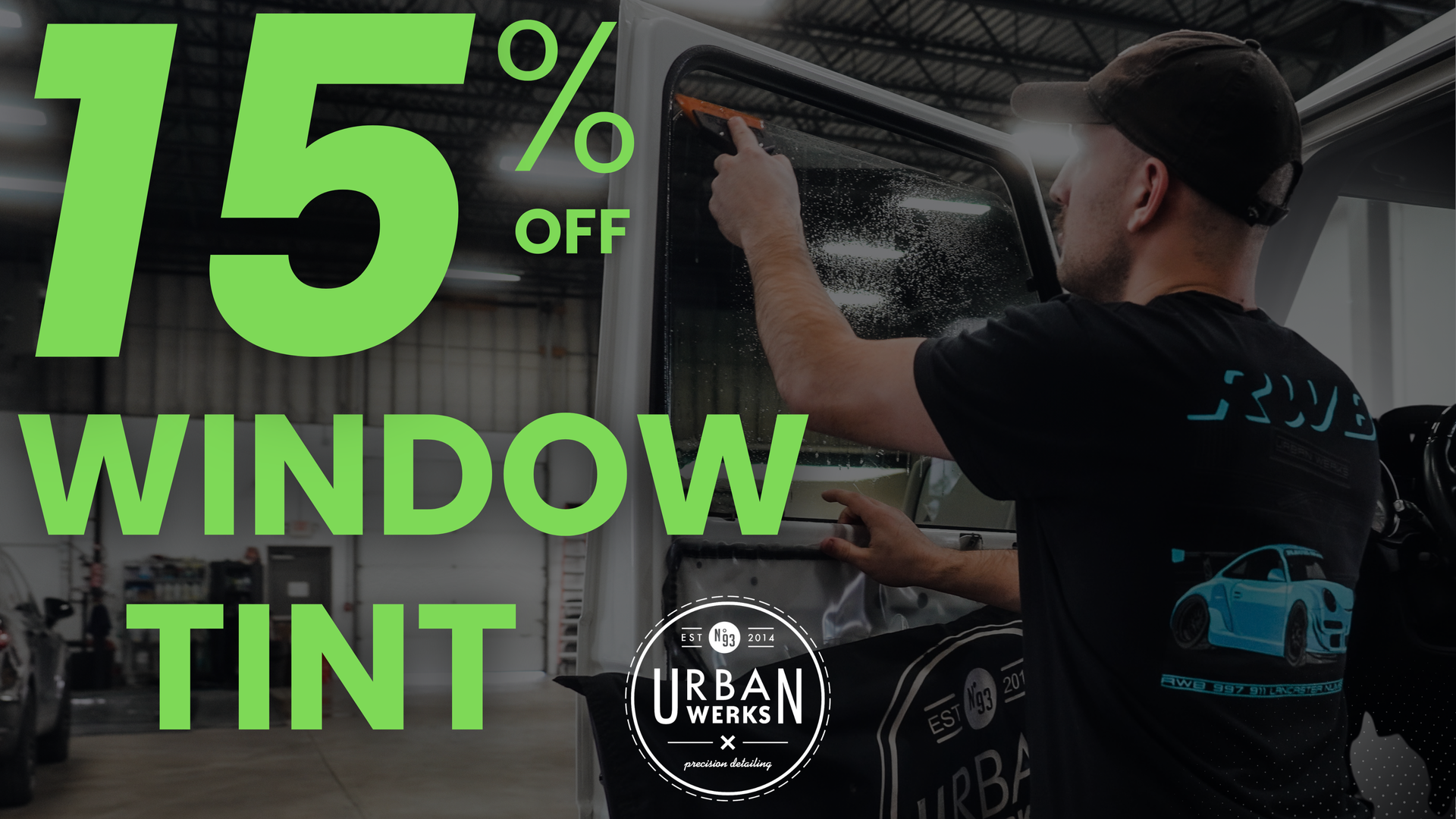 15% off window tint. Man applying tint to a van window, green text, Urban Garage logo.