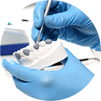 Dentist Doing Dentures — Dental Care in Fresno, CA