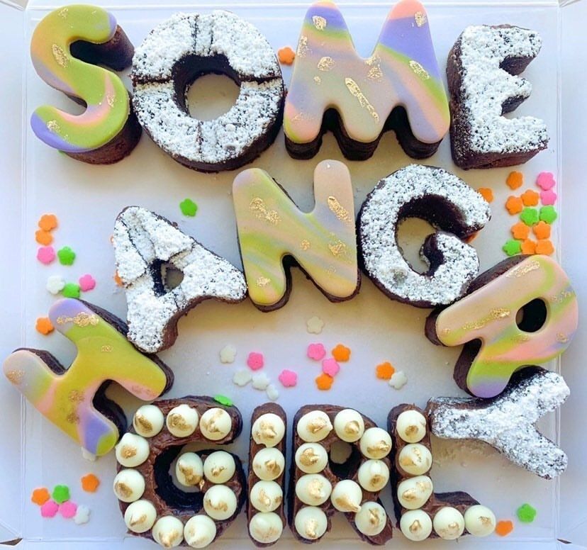 A cake that says some anger girl on it