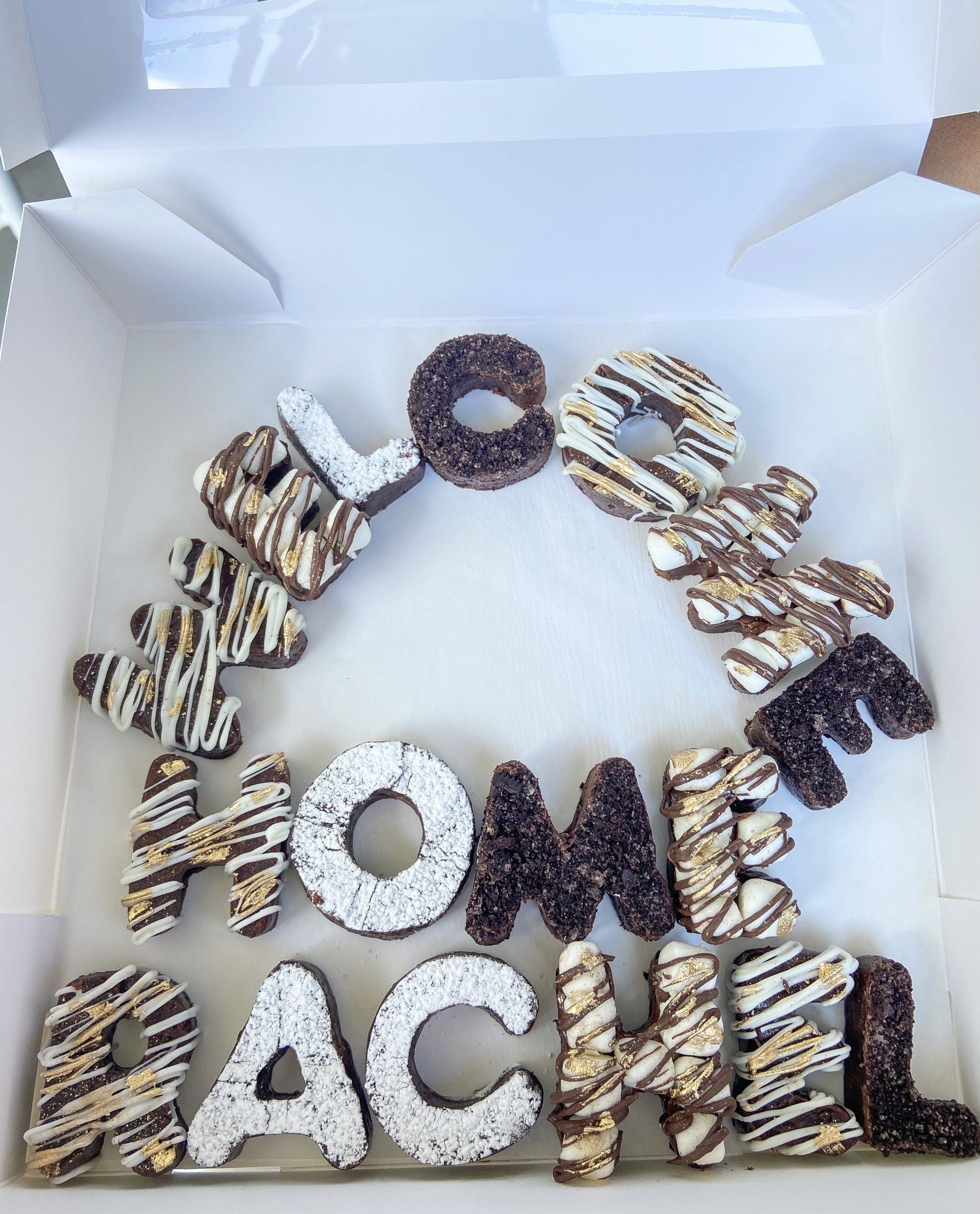 A box of pretzels that spell out the name rachel