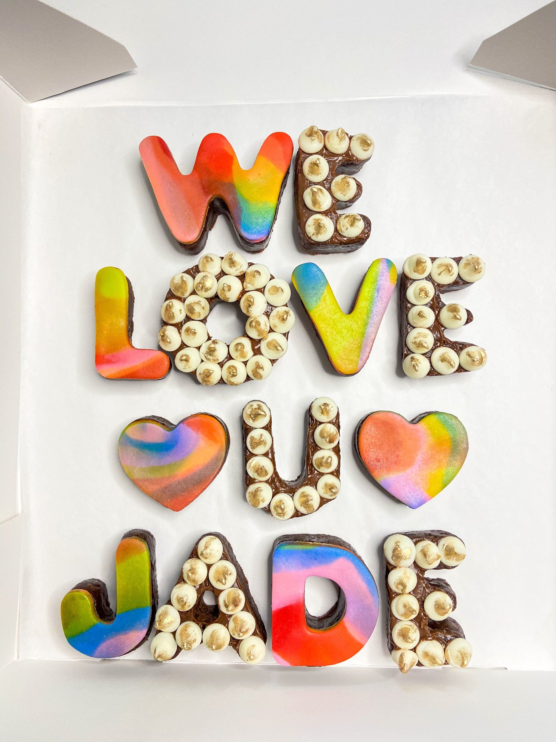 A box of candy that says we love jade