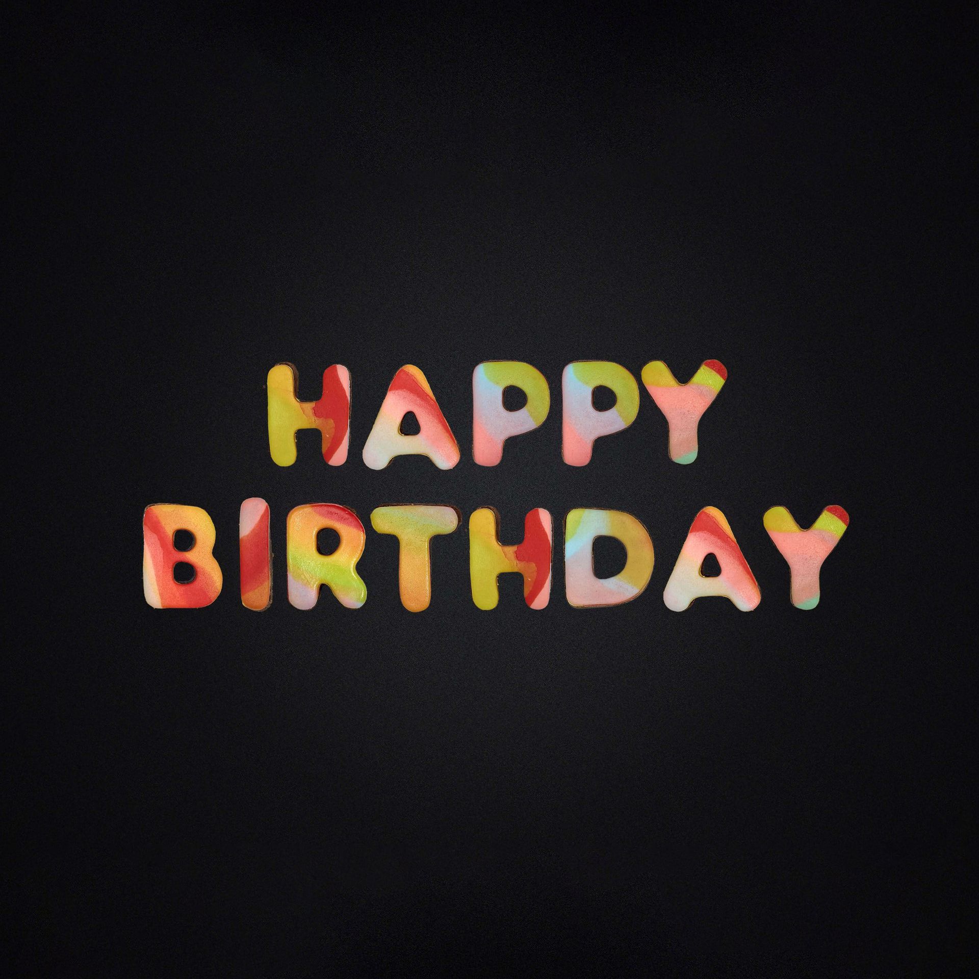 A black background with the words happy birthday on it