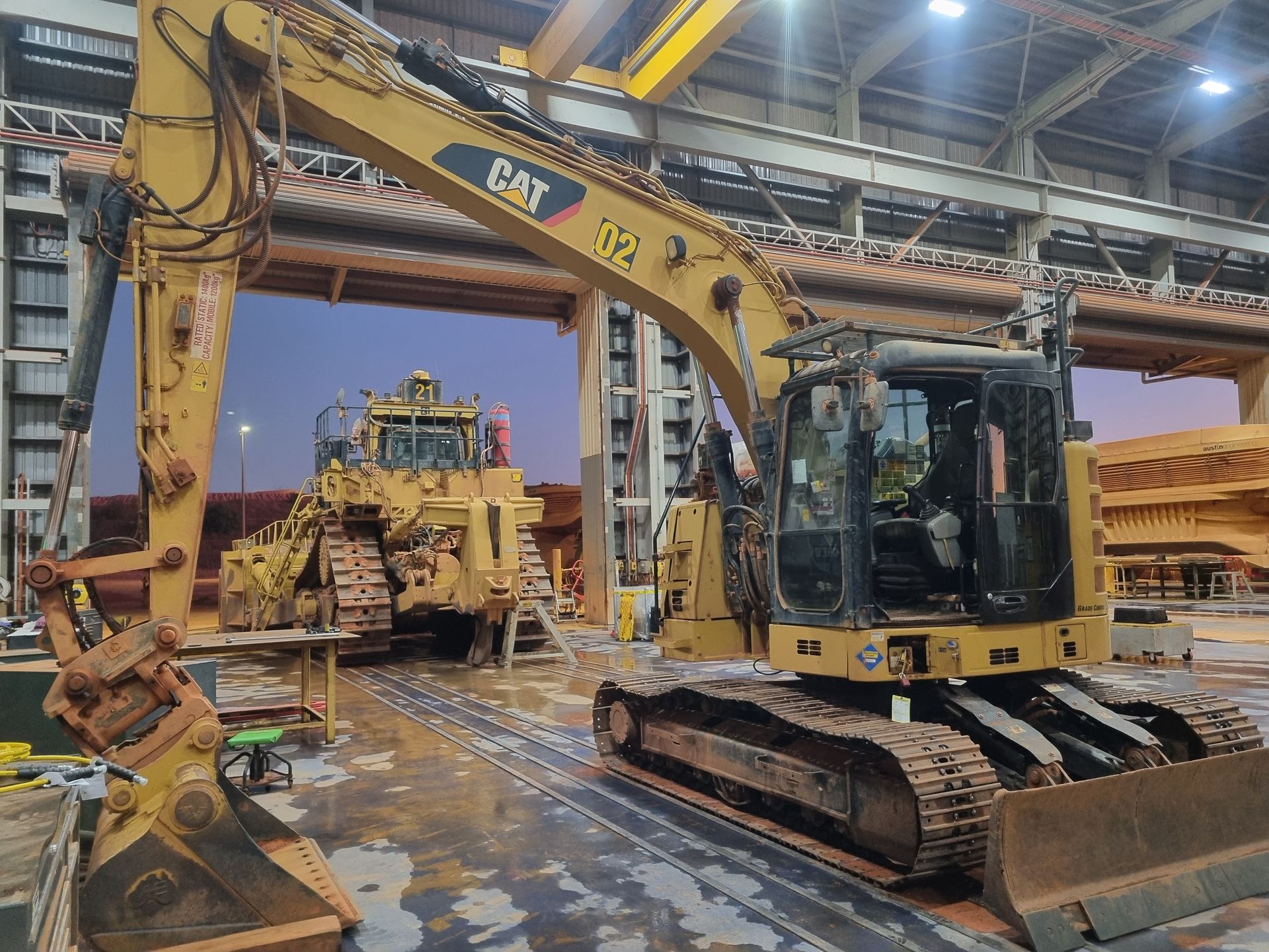 A Close Up Of A Yellow Machine With Hydraulic Hoses — Blue Diesel & Equipment In Speewah, QLD