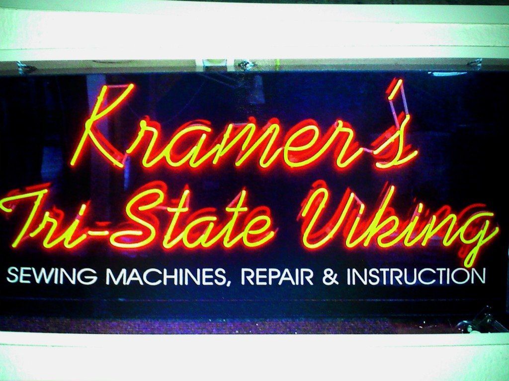 Neon with Vinyl Lettering Tagline
