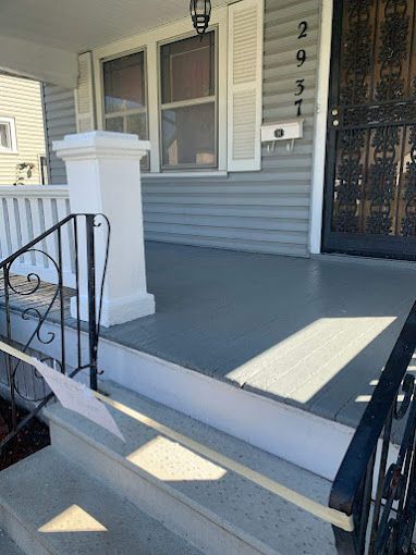 The front porch of a house with the number 2351 on it