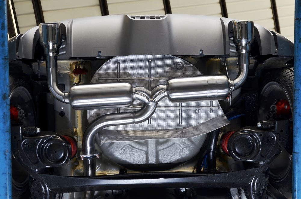 The Exhaust Pipes on the Back of a Car Are Visible — Sprint Mufflers, Exhausts & Mechanical Repairs in Stuart, NT