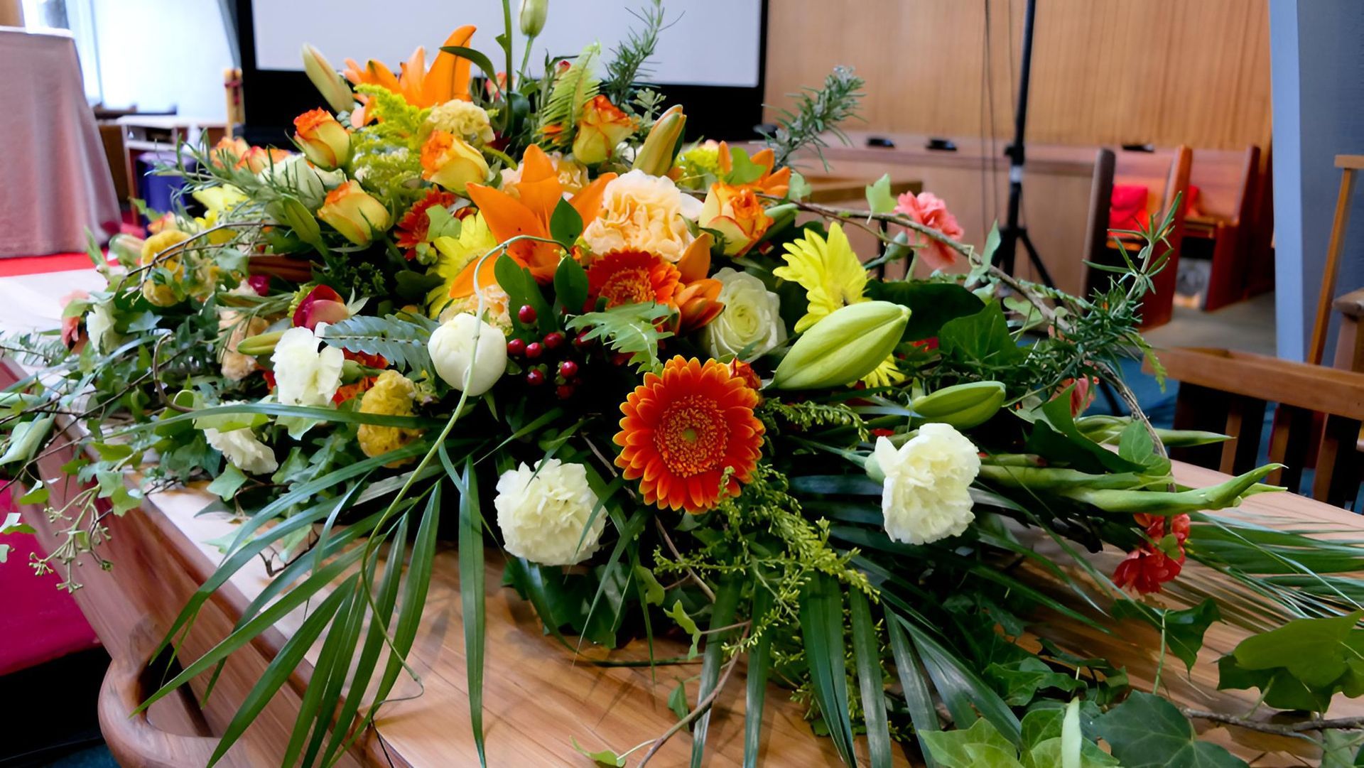 Funeral Flowers on a Coffin — Territory Funerals In Yarrawonga, NT