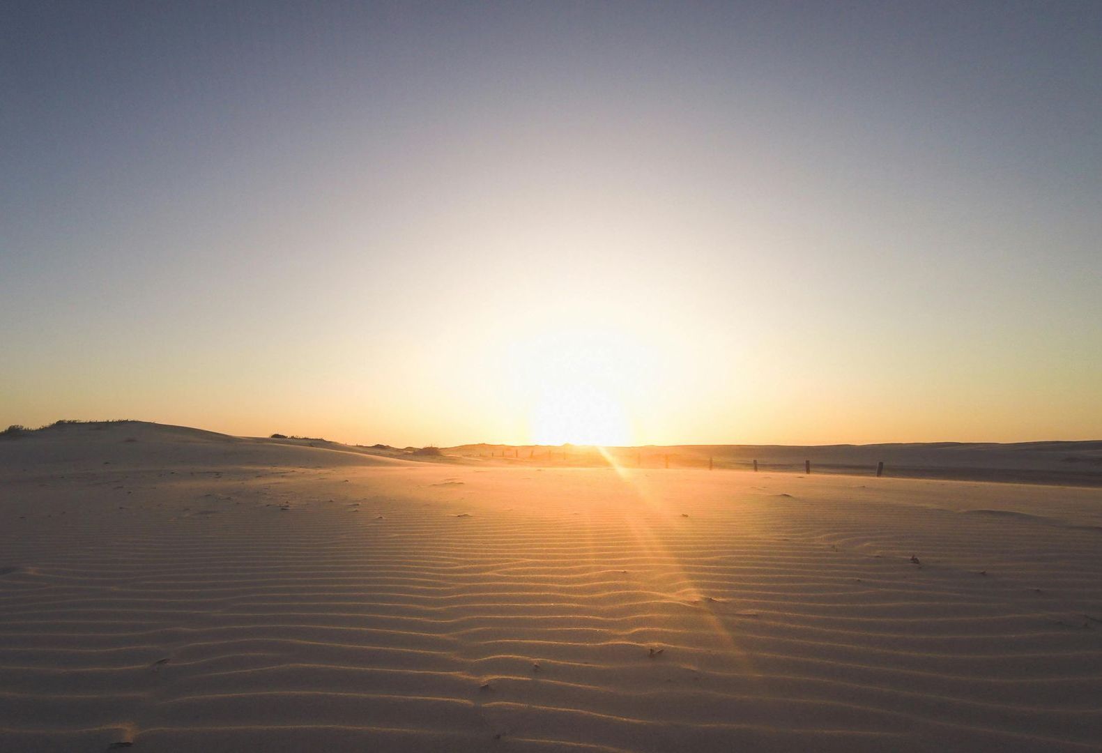 A Urn Is Sitting On A Table Next To Candles — Territory Funerals In Yarrawonga, NT