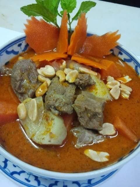 a Bowl of Soup With Carrots and Peanuts on Top — Thai Satay Hut In Lismore, NSW