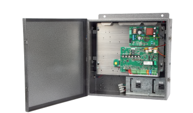 A metal box with a bunch of electronic components inside of it