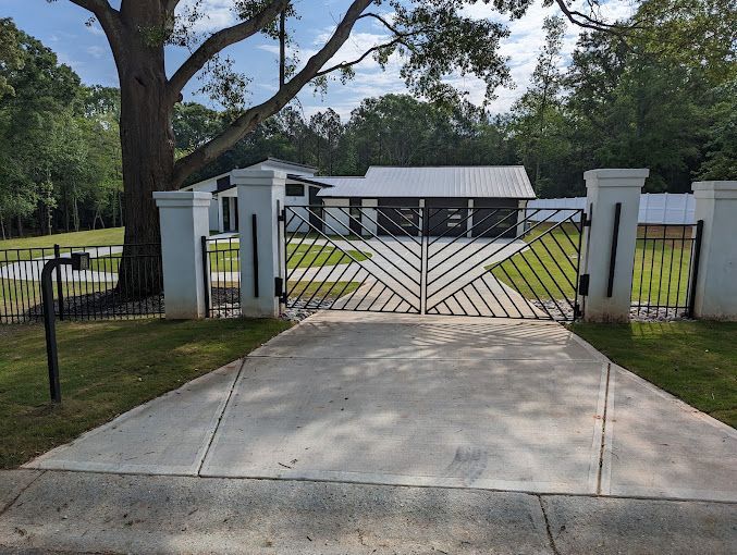 A gated entrance to a residential area with a speed limit of 25