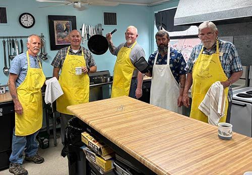 Men's breakfast crew in the kitchen