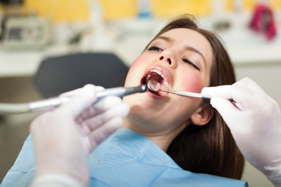 dentista visita paziente