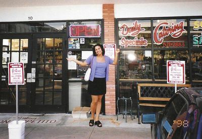 Woman in front of a store with an 