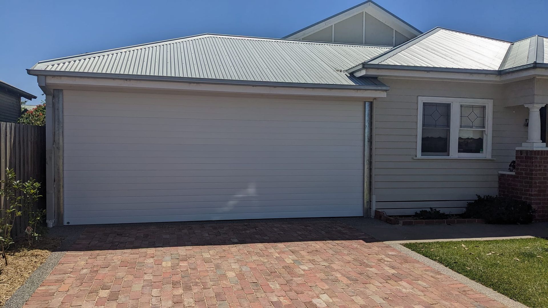A White Roller Garage Door on a House  — Goldfields Garage Doors & Gates in Wendouree, VIC