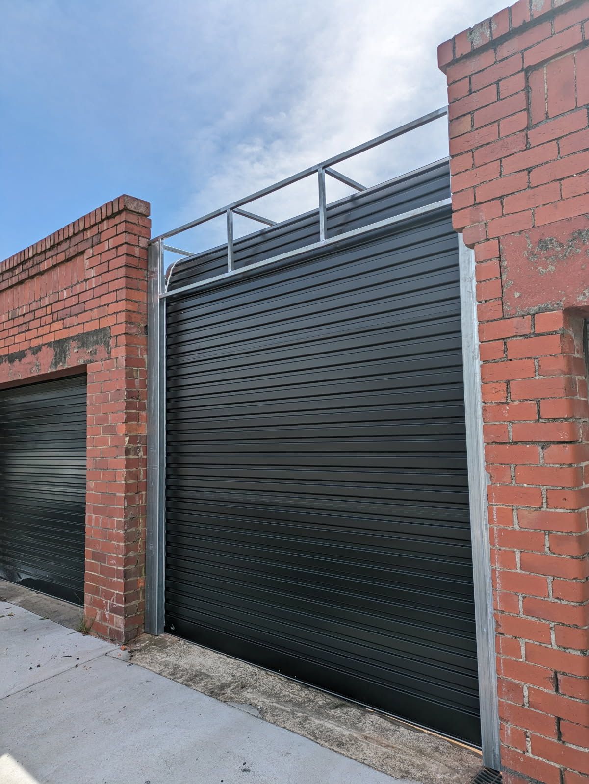 Black Garage Roller Doors — Goldfields Garage Doors & Gates in Wendouree, VIC