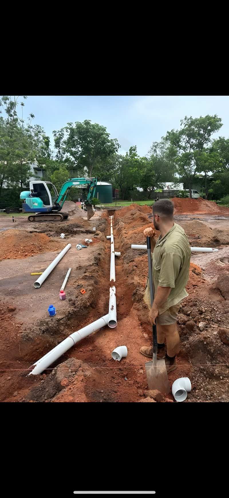 A Person Digging a Trench for PVC Pipes — Darwin Plumbing Maintenance in Knuckey Lagoon, NT
