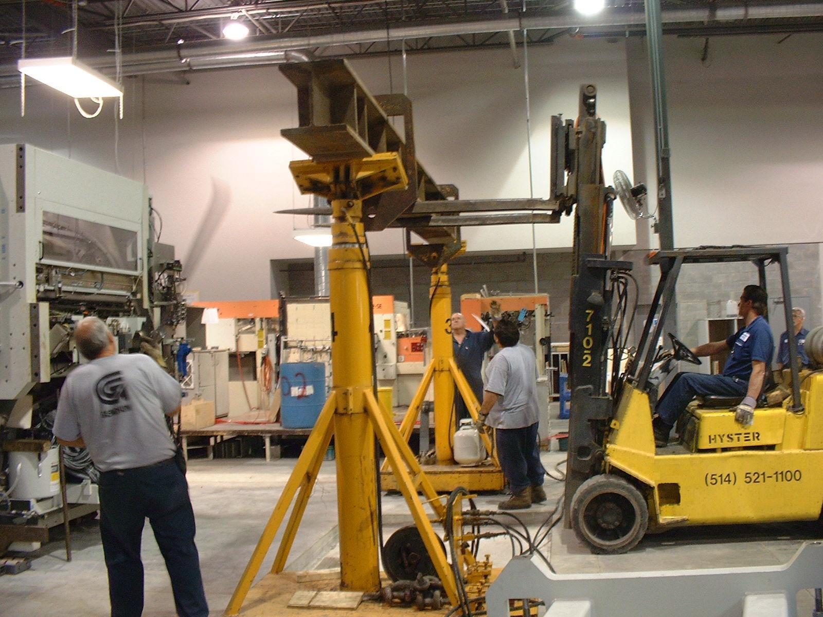 A yellow forklift with the number 15m on it