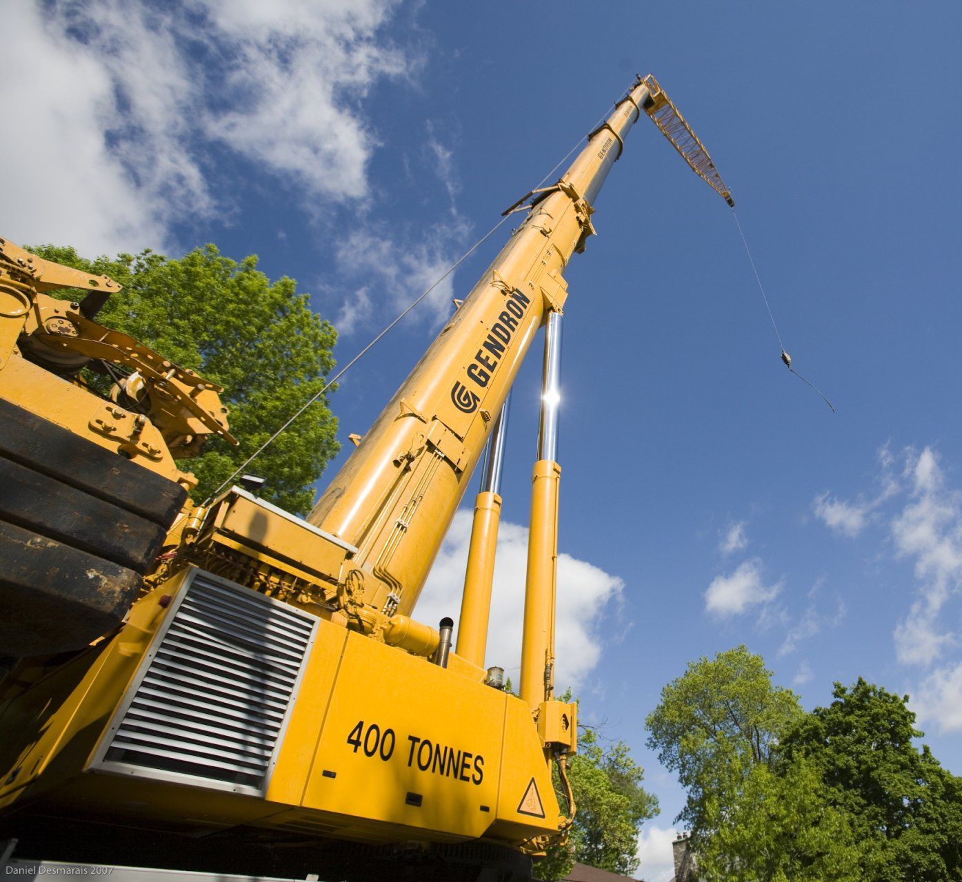 A large yellow crane with 400 tonnes on it