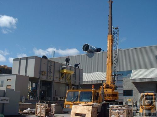 A yellow crane with the word edition on it