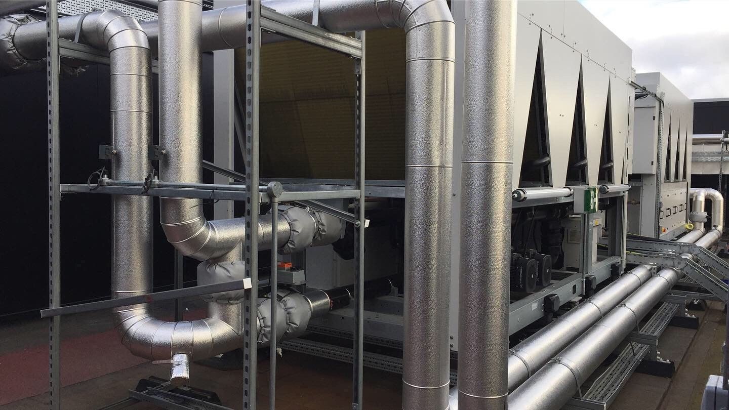AC roof chiller pipework insulated and weather protected with aluminium cladding by Lagforce.