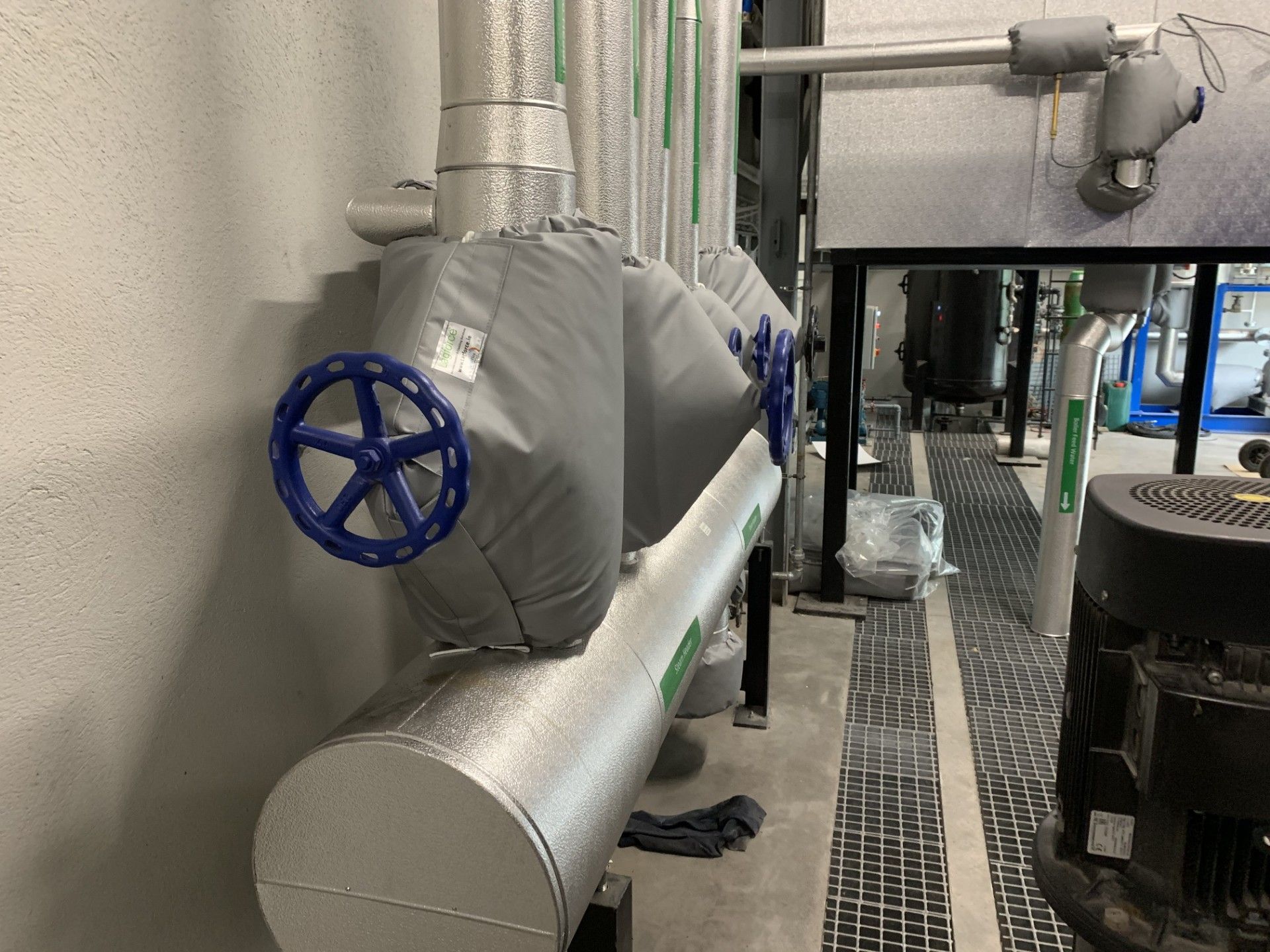 Steam pipework header and valves insulated and clad by Lagforce