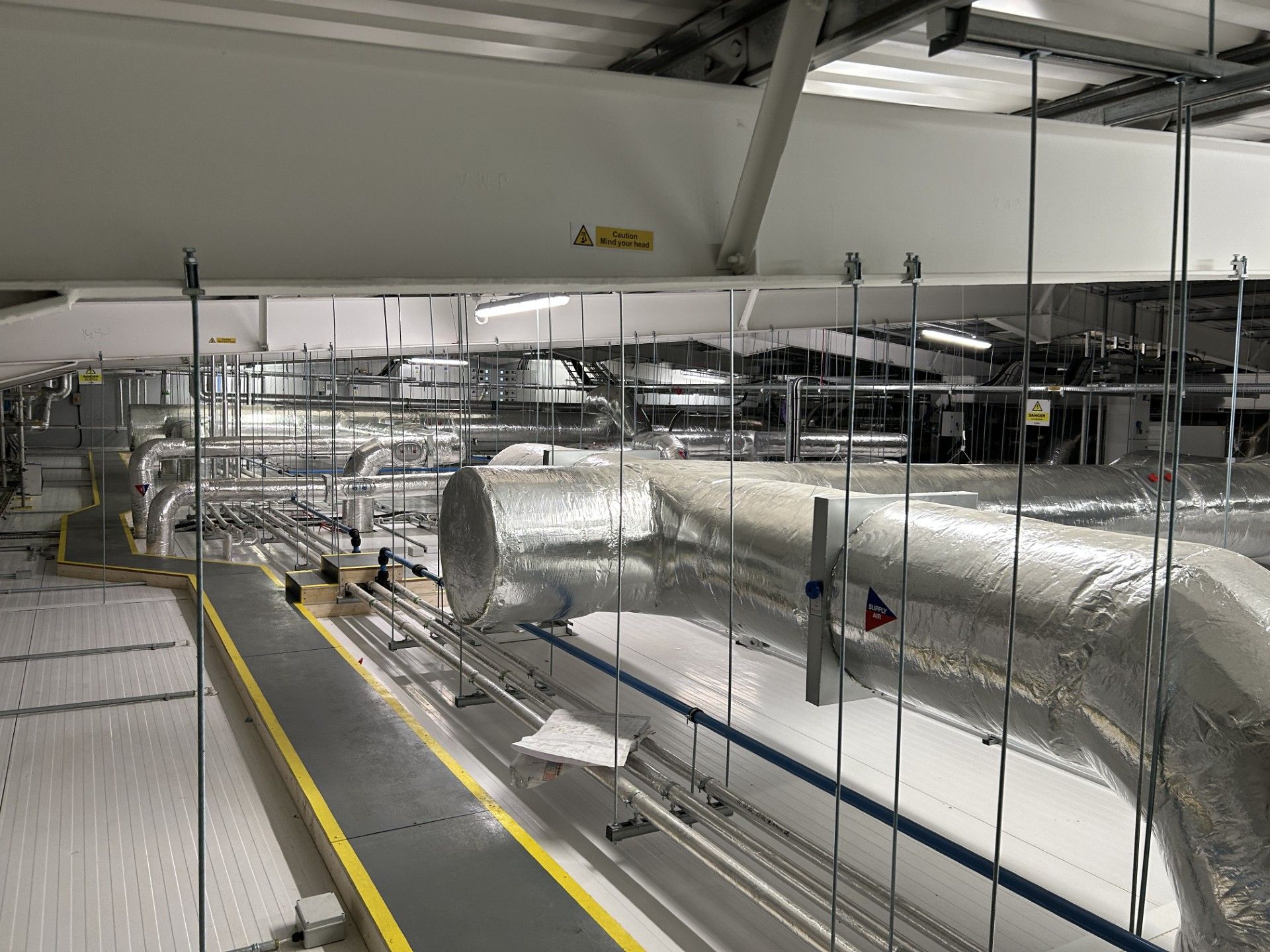 Ventilation ducting and water services pipework insulated with foiled fiberglass by Lagforce in Nass in Kildare