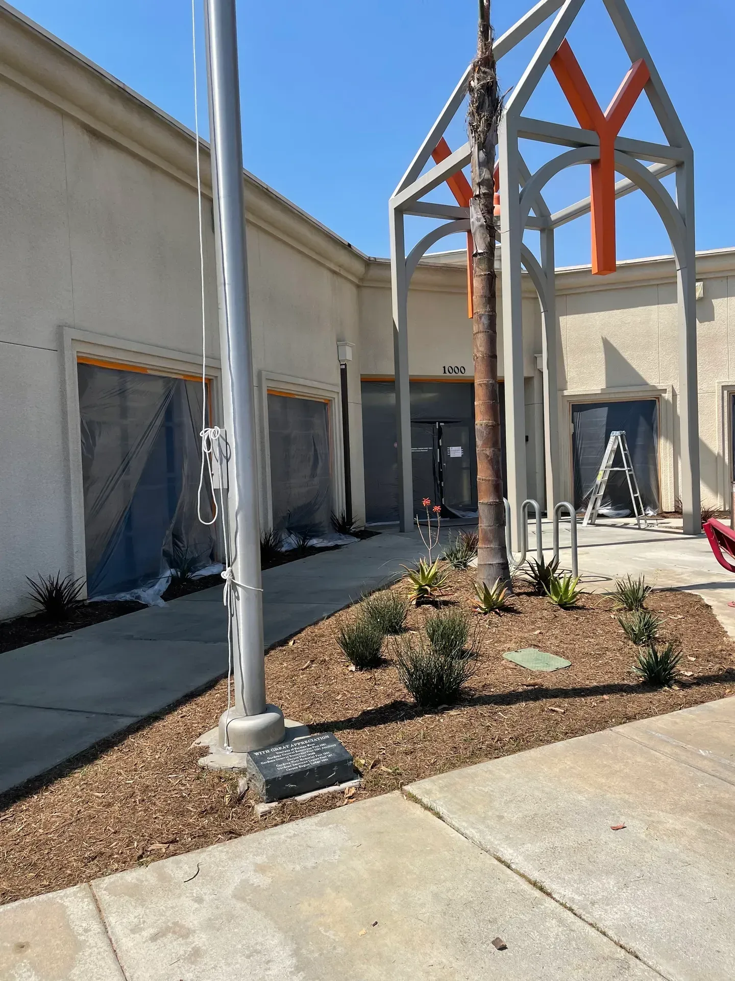 A building with a large y on the top of it