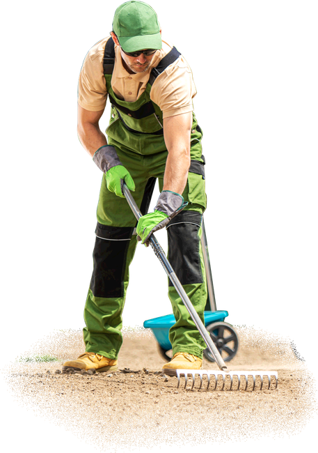 landscape worker with rake preparing soil for grass turfs installation