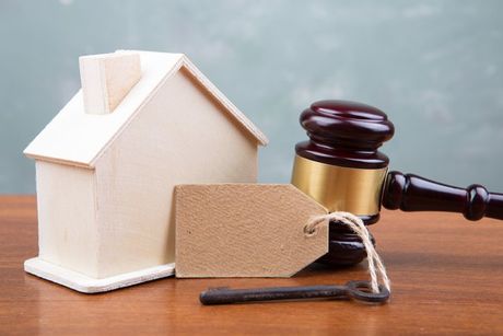 Real Estate  — Gavel and House Model on the Wooden Table in Venice, FL
