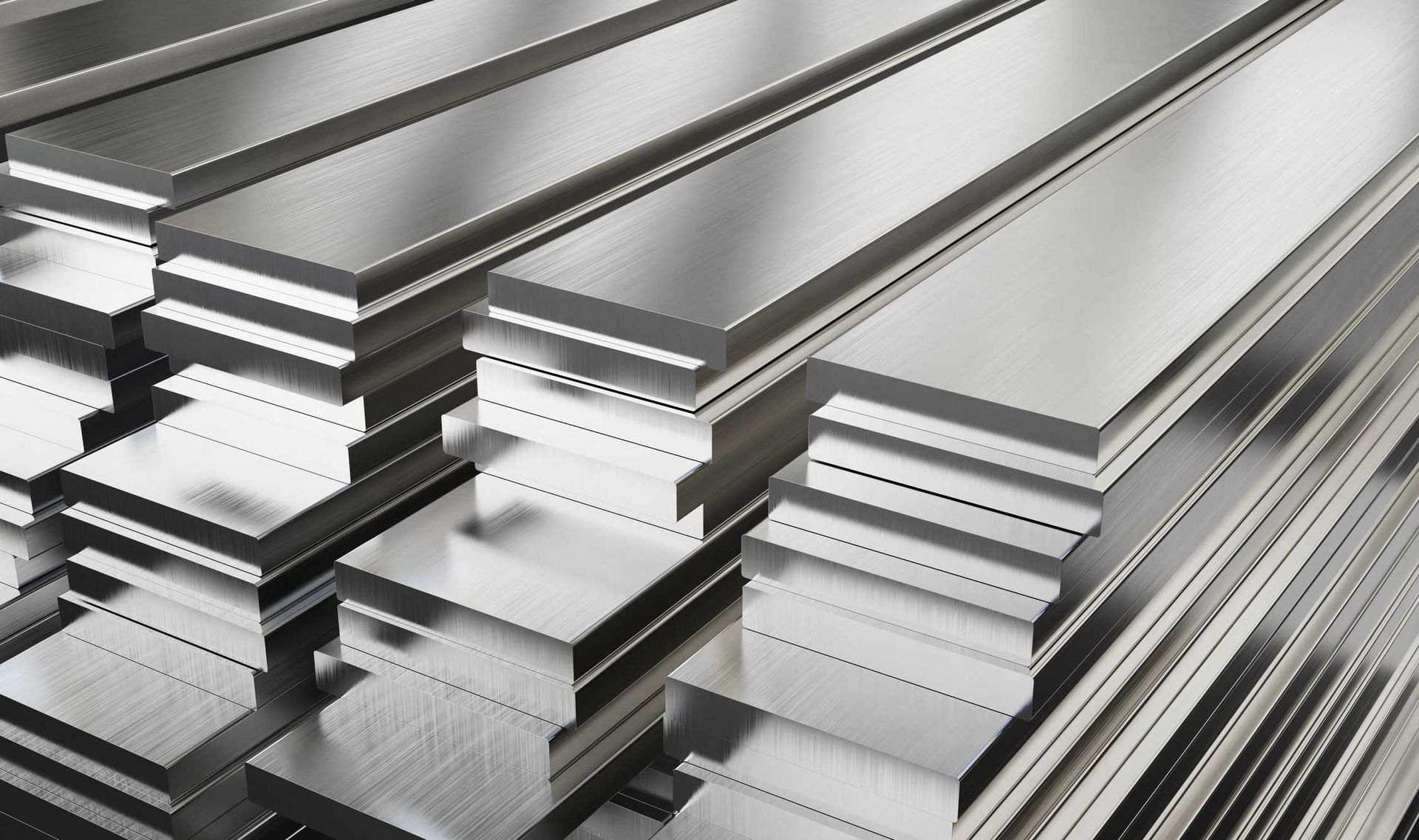 A stack of stainless steel bars are stacked on top of each other.