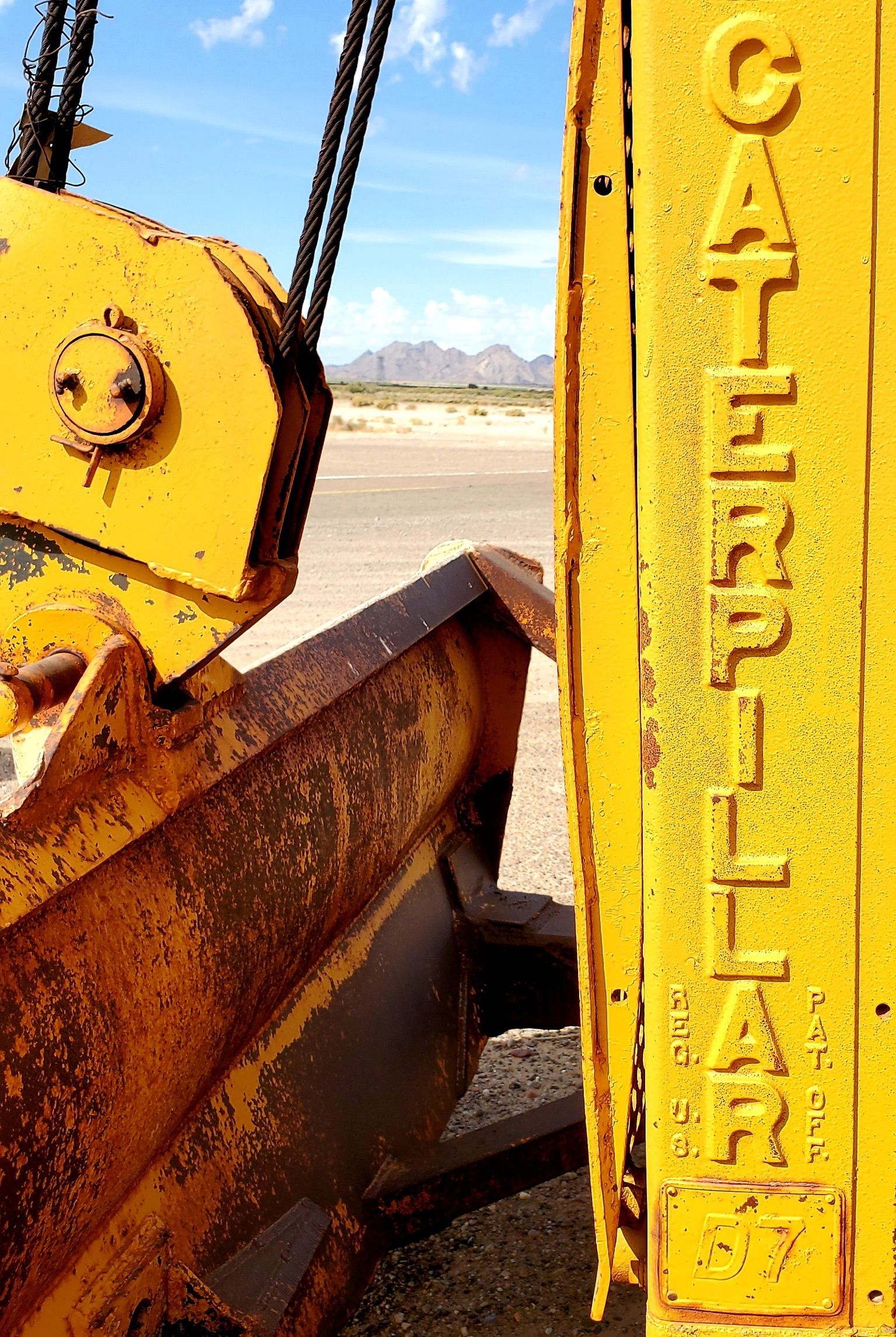 A close up of a yellow machine with the word california on it
