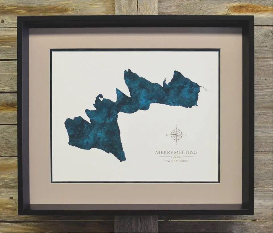 Framed teal map of Sebago Lake, Maine with compass rose and lake name.