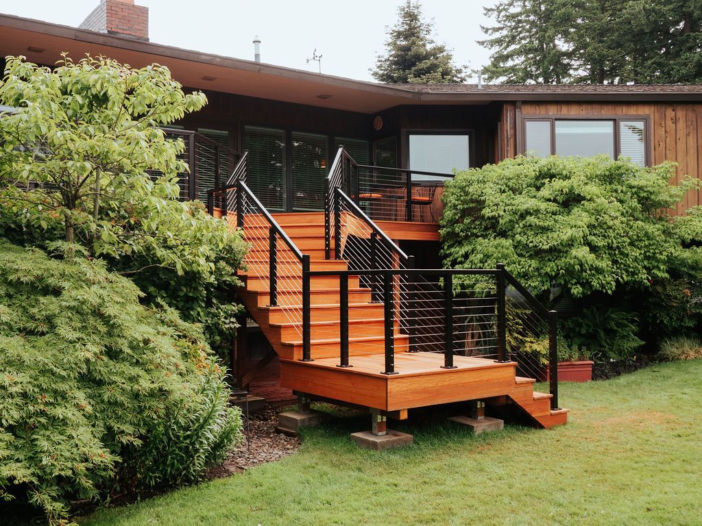 A nice new deck with steps and metal railing in Ashland, Oregon