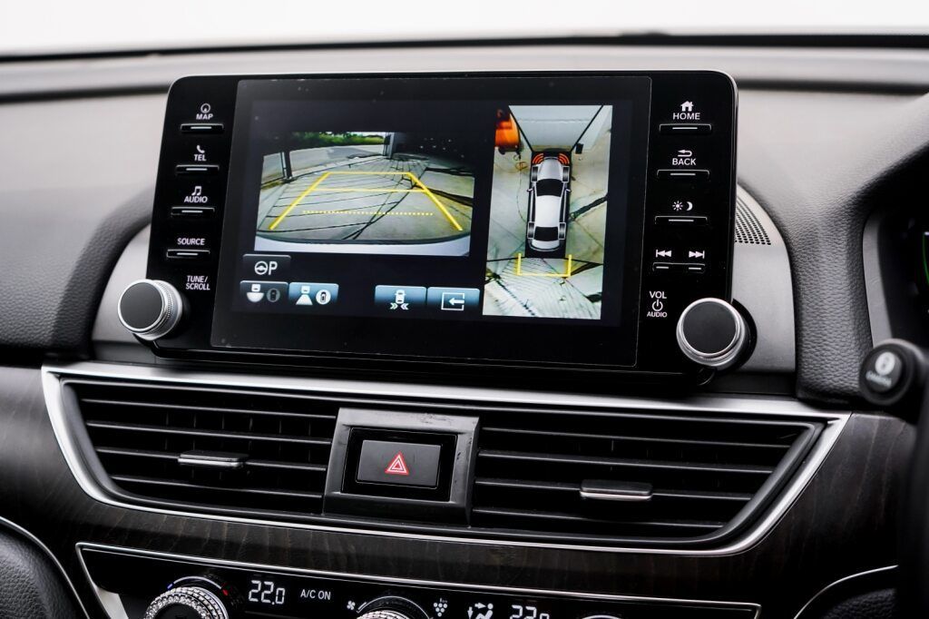 Car Dashboard With Display Showing Overhead and Rear-view Camera — H & E Auto Electrics in Noosaville, QLD
