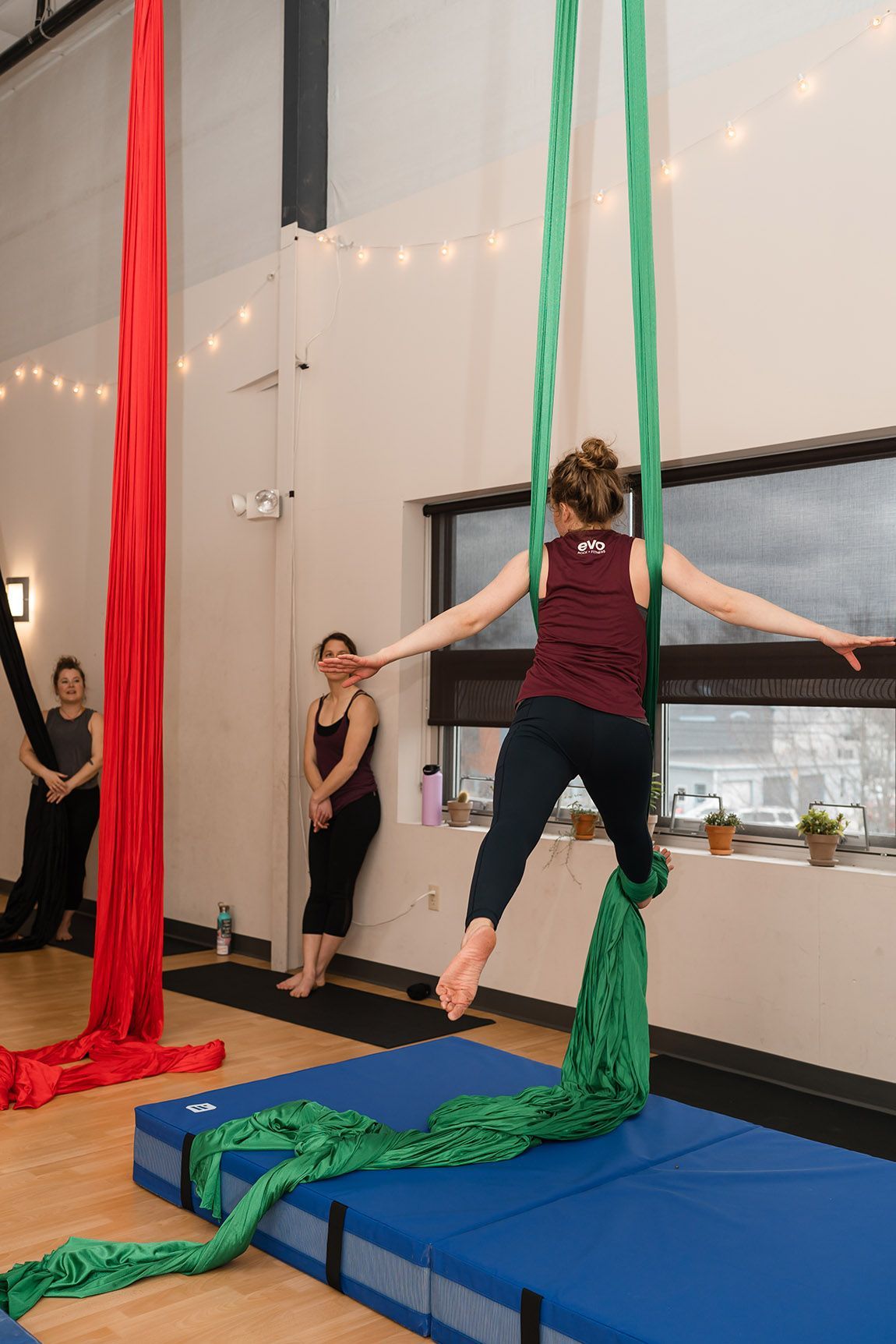Person balances on stacked crates