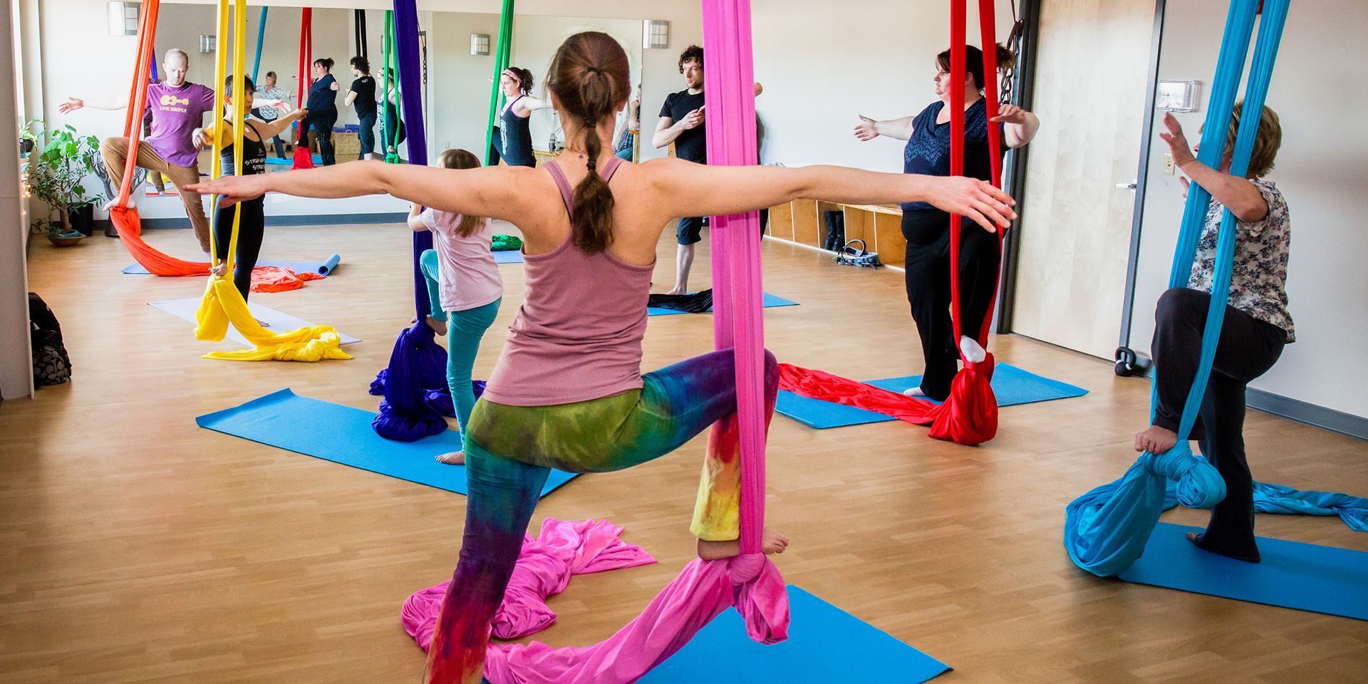 Person balances on stacked crates 