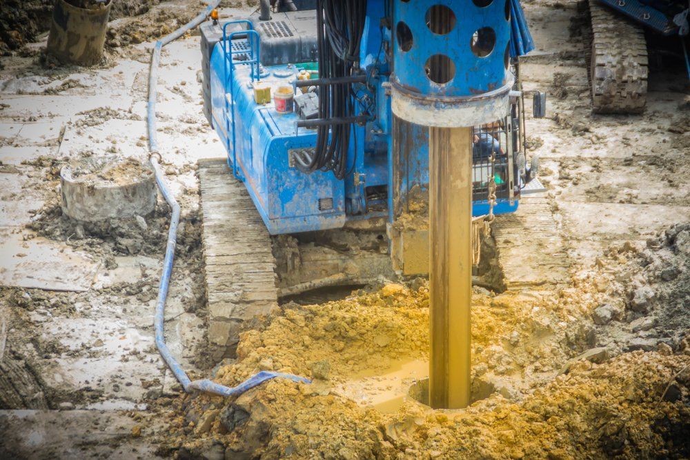 Hydraulic Drilling Machine Is Boring Holes In The Site - Drilling or Bore Pump Service in South Kolan, QLD
