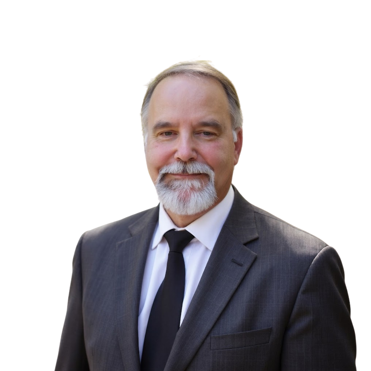 Portrait of a smiling man in a dark suit and tie against a white background