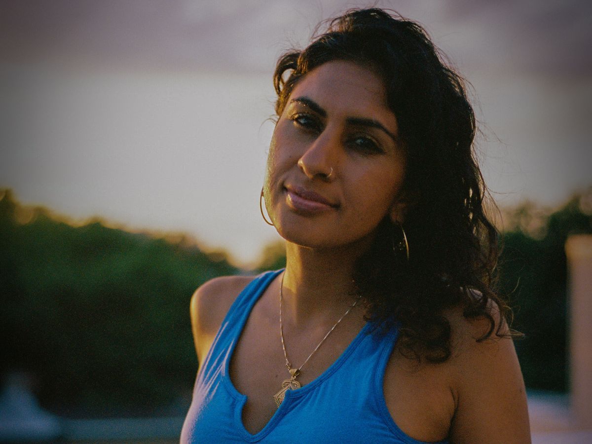 Sheena Sood speaking on the Equitable Wellness Podcast about decolonizing yoga & Omwashing