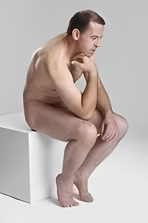 Professional male life model posing nude for life drawing art class